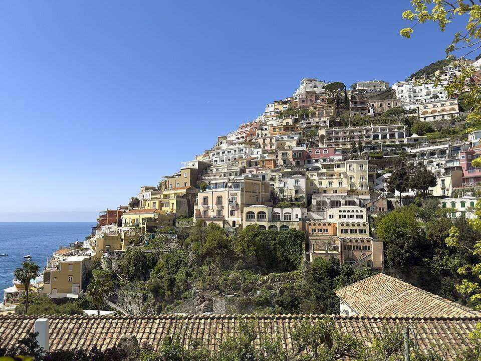 Pastel houses of Positano stacked above the Tyrrhenian Sea