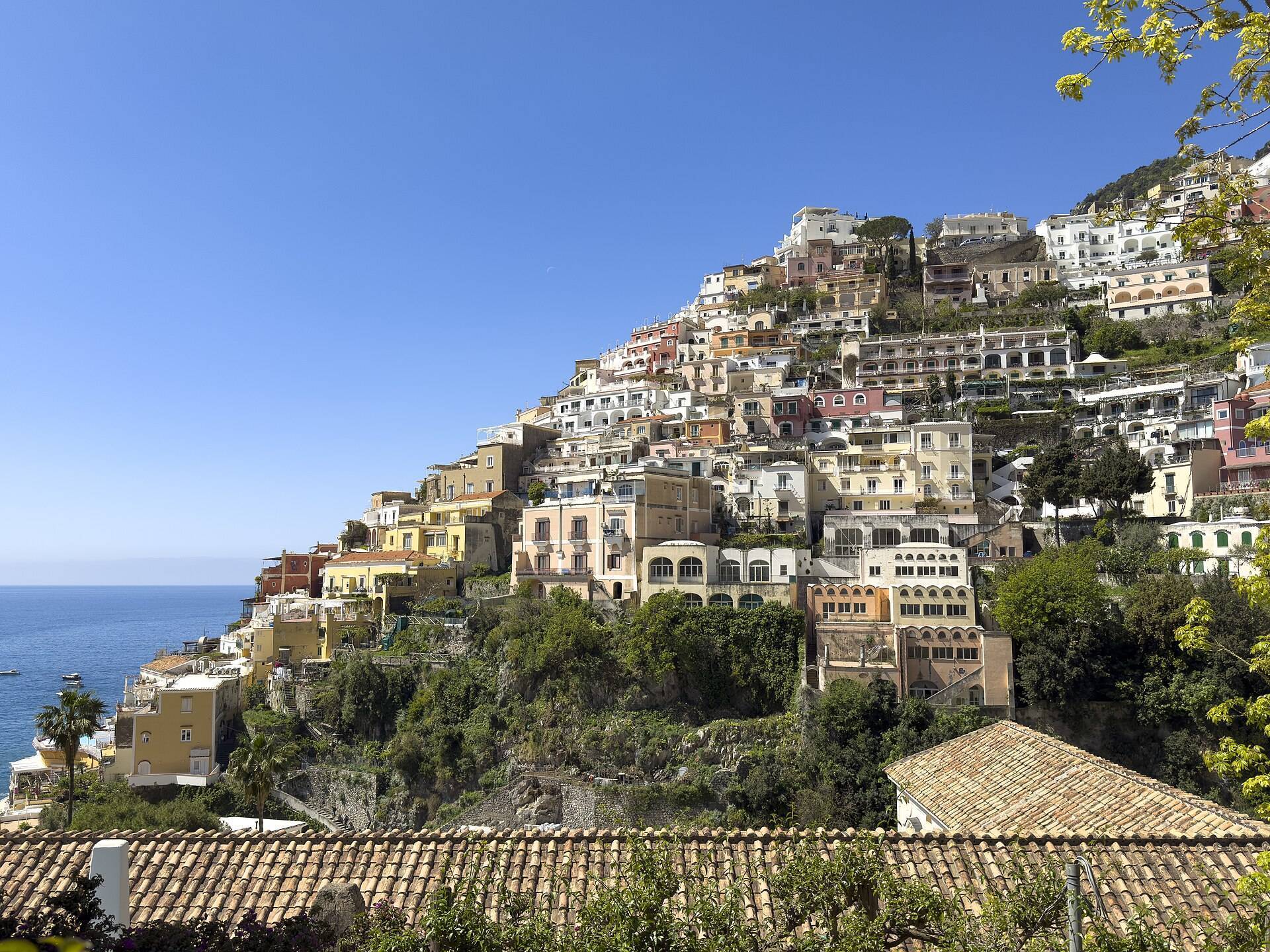 Pastel houses of Positano stacked above the Tyrrhenian Sea