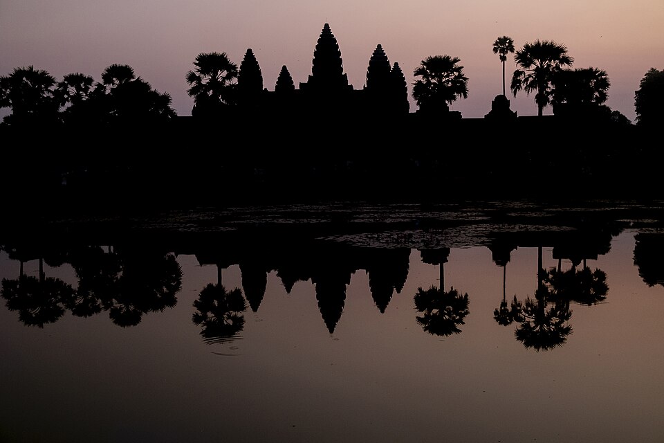 Angkor Wat's towers reflected at sunrise