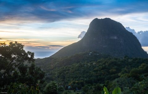 The Pitons rising straight out of the sea off Saint Lucia — Caribbean Island Hopper: Guadeloupe to Saint Lucia