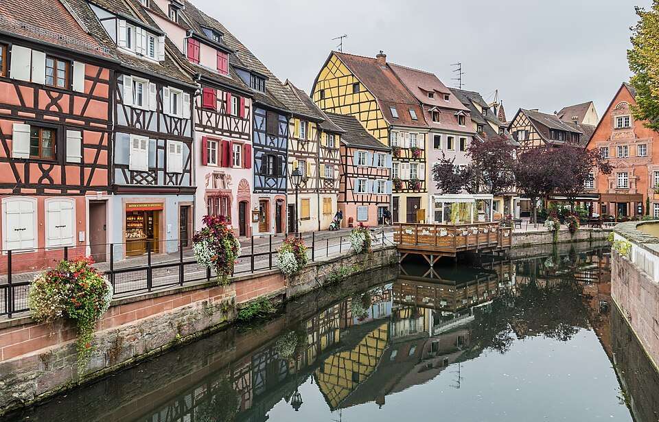 Colmar's Little Venice — half-timbered houses reflected in the Lauch