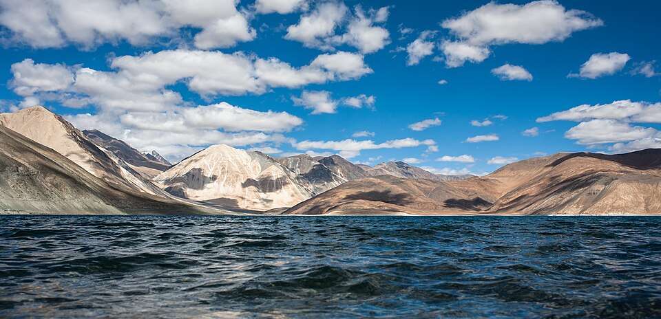 Pangong Tso's impossible blues beneath bare mountains