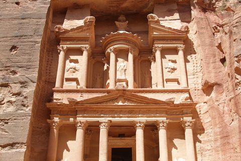 Petra's Treasury glowing rose through the Siq