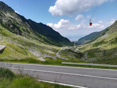 The Transfăgărășan's switchbacks climbing the Făgăraș range