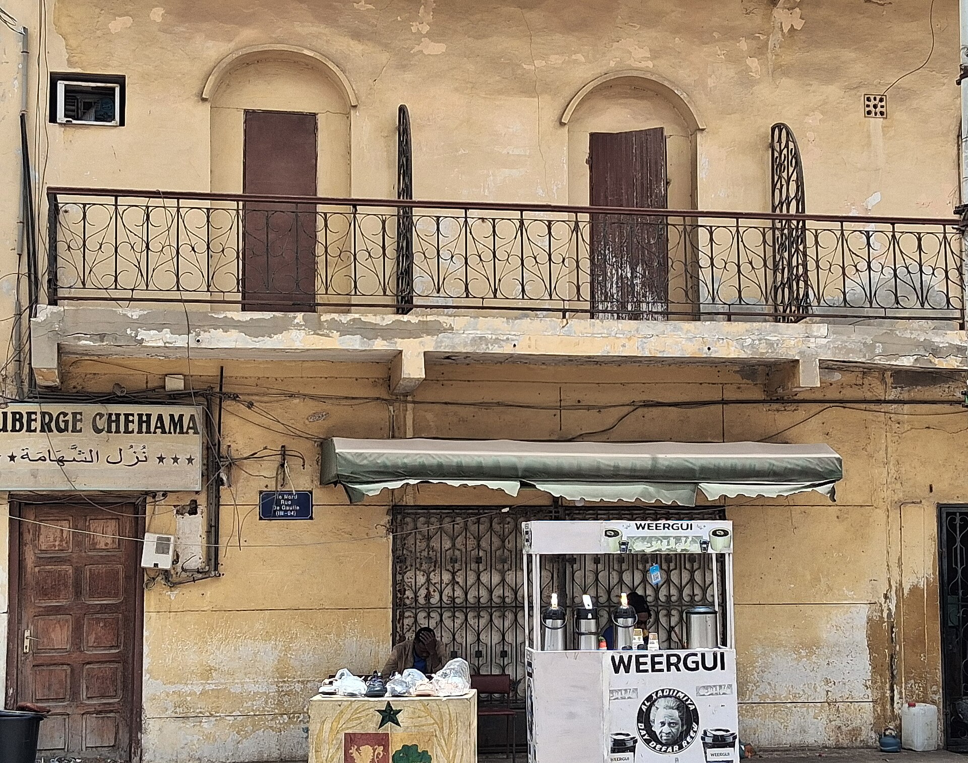 Colonial balconies and shuttered facades in Saint-Louis