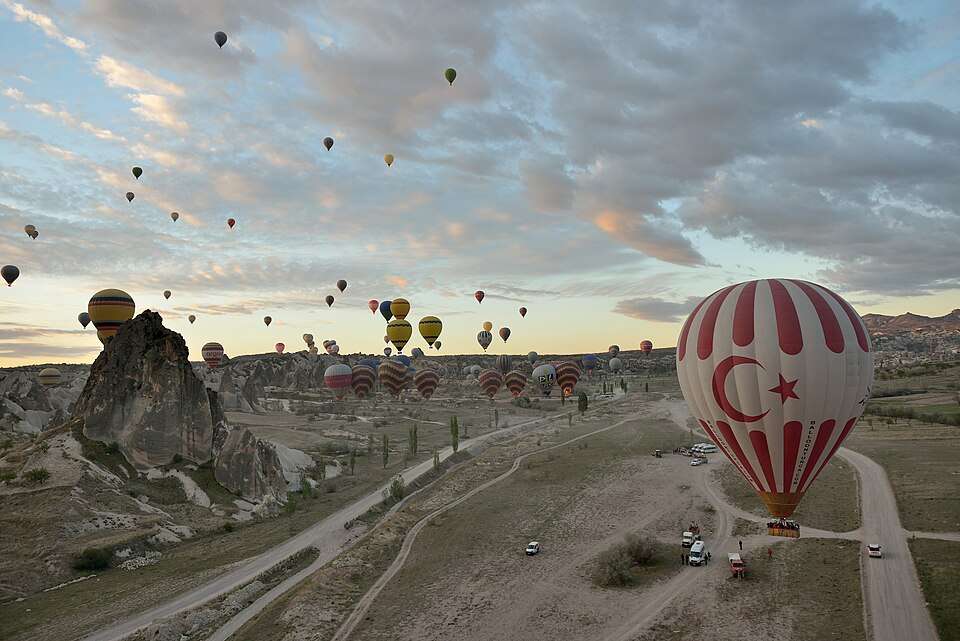 Hot-air balloons drifting over Cappadocia's fairy chimneys