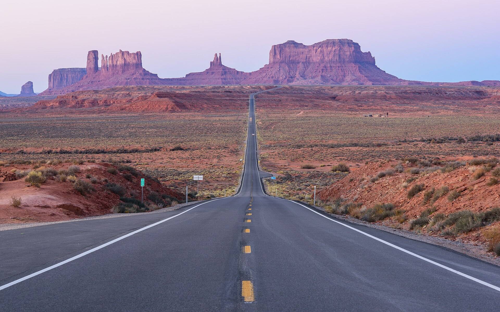 The long straight road into the buttes of Monument Valley